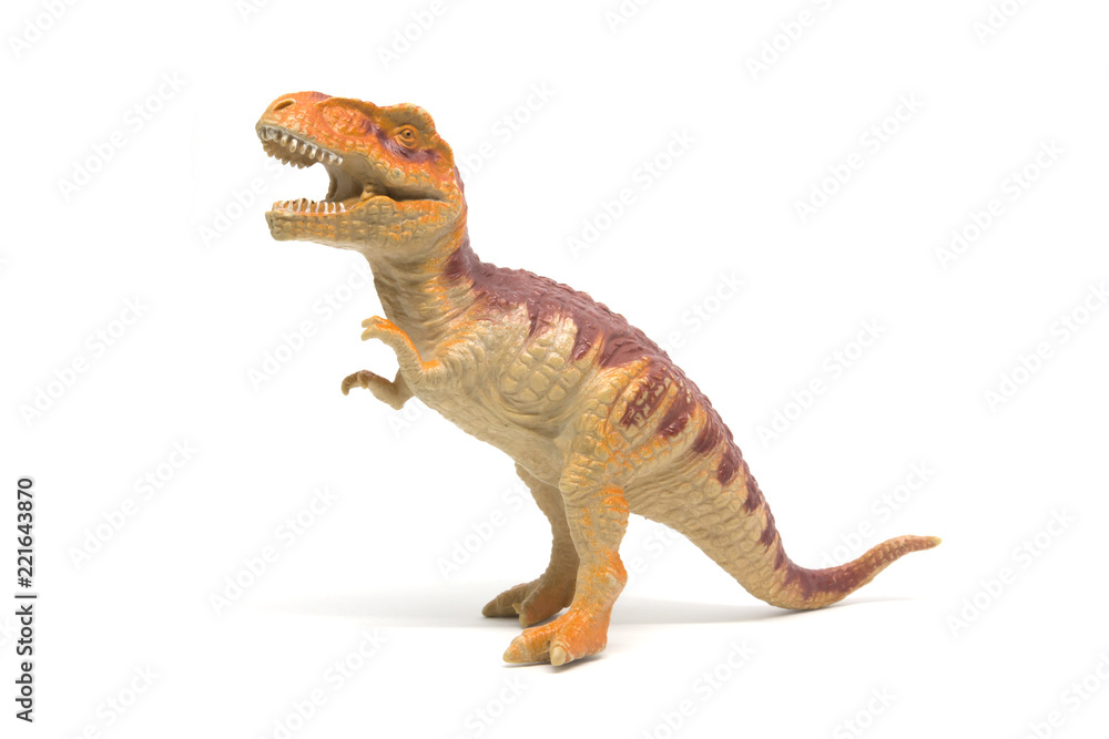 Obraz premium Plastikowa zabawka tyranozaura na białym tle