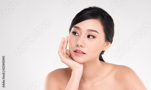 Beautiful Young Asian Woman with Clean Fresh Skin