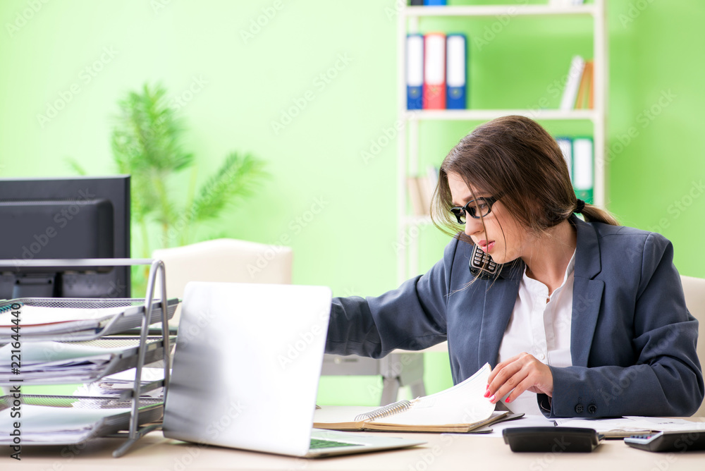Female financial manager working in the office Female financial manager working in the office