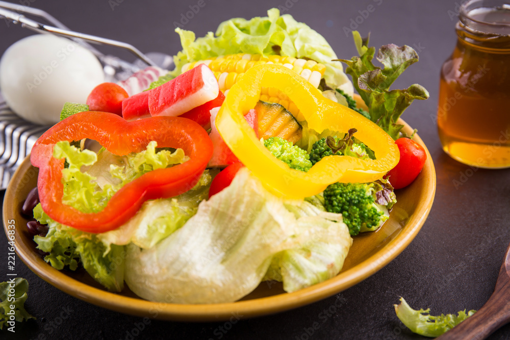close up,.Salad healthy food on black stone background. .Weight loss. close up,.Salad healthy food on black stone background. .Weight loss.