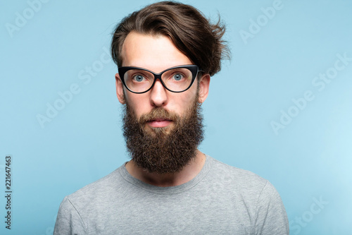 Photography bearded hipster guy wearing cat eye glasses
