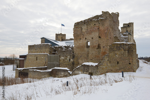 Ruins of the medieval castle of the Livonian knight's order in the gloomy March day. Rakvere, Estonia