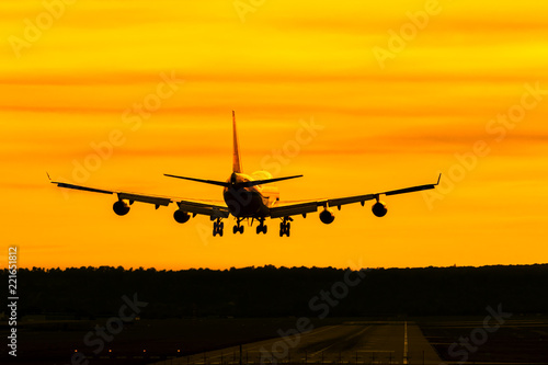 Airplane - Jambojet - landing at sunset 