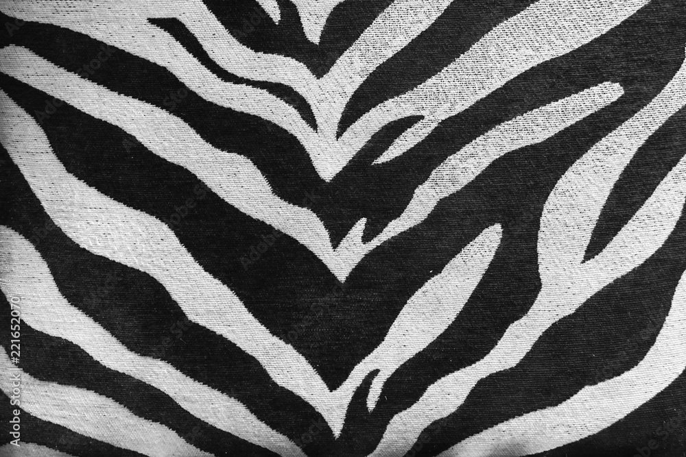 Zebra pattern. A closed up pattern details of zebra texture of an old sofa. Texture and background usage. Zebra pattern. A closed up pattern details of zebra texture of an old sofa. Texture and background usage.