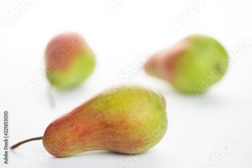 green ripe pear on white background © lms_lms