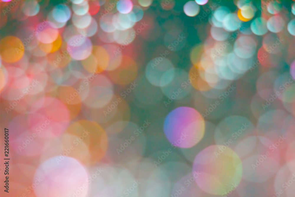 Abstraction colorful bokeh on a dark background. Defocused. Abstraction colorful bokeh on a dark background. Defocused.