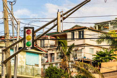 Street light sign and wires over an intersection in St. Thomas, after the IRMA hurricane. photo