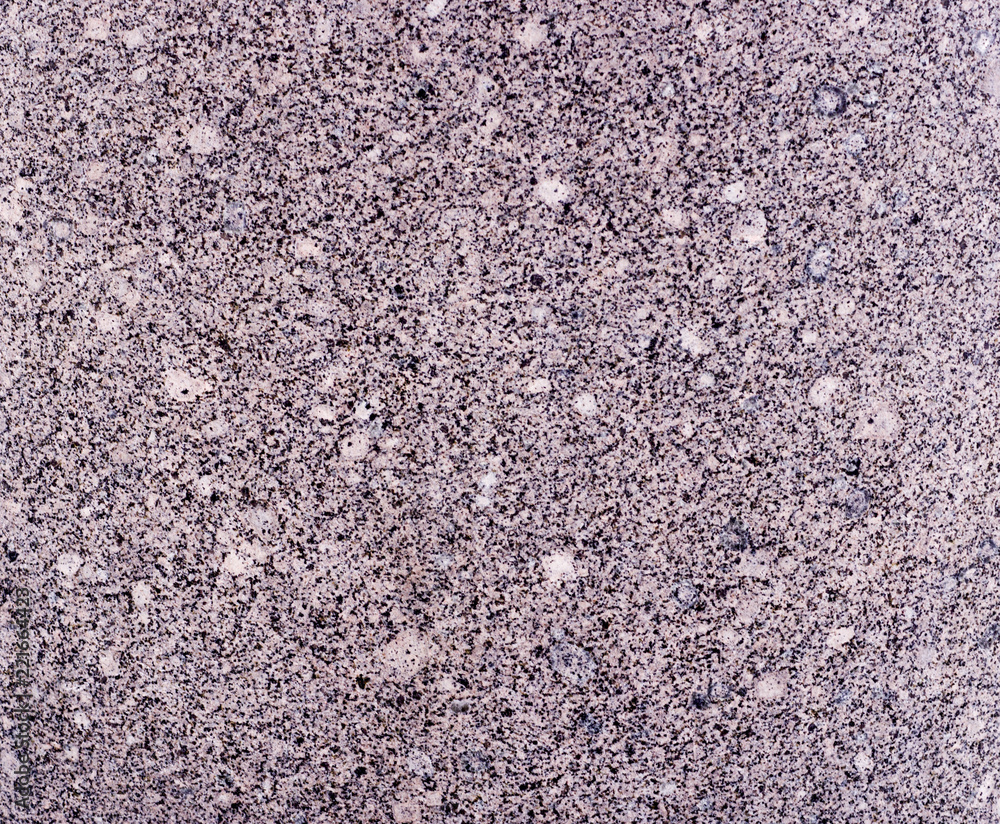 granite texture with gray base and black spots. background, geological granite texture with gray base and black spots. background, geological