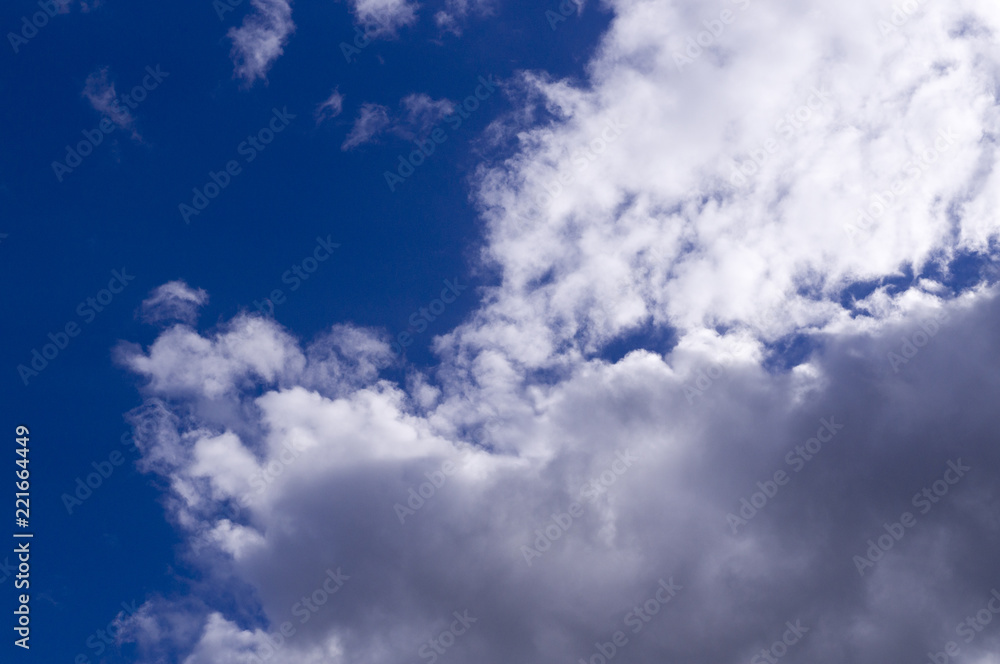 Fototapeta premium blue sky with white and gray clouds; cumulus. background; nature