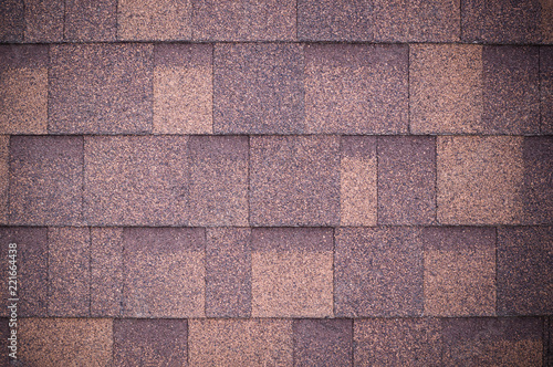 roof of new brown shingles background and texture. vignette