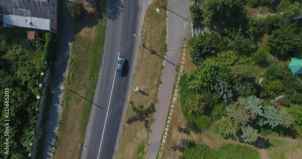 Aerial Tracking Shot Of Car Moving On A Road Aerial Tracking Shot Of Car Moving On A Road