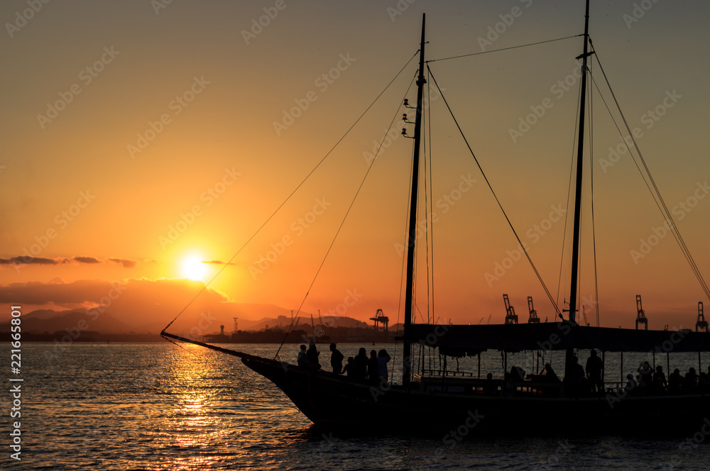 Boat Sailing on the sunset