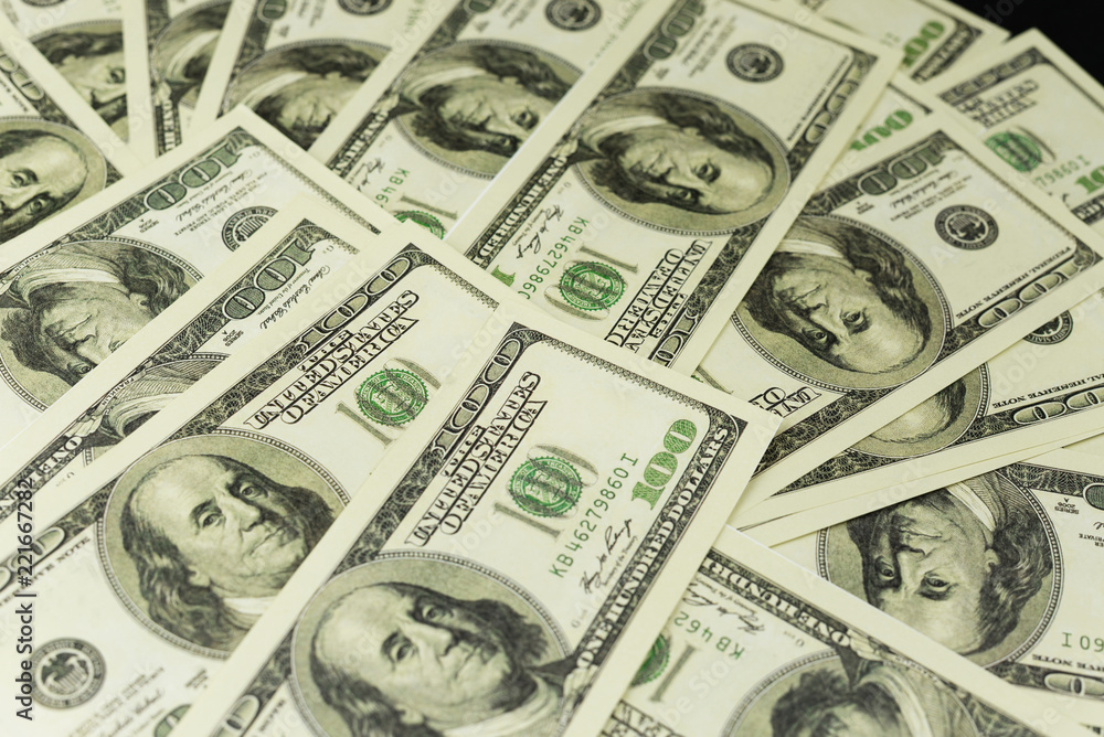 background of a lot of banknotes of money cash 100 dollars background of a lot of banknotes of money cash 100 dollars