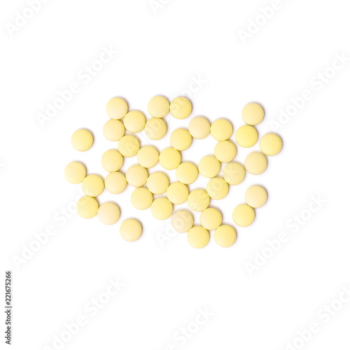Medicine white and yellow pills or capsules