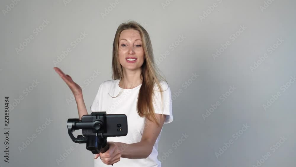 Fasion blogger make video blog, vlog, with her mobile camera Fasion blogger make video blog, vlog, with her mobile camera