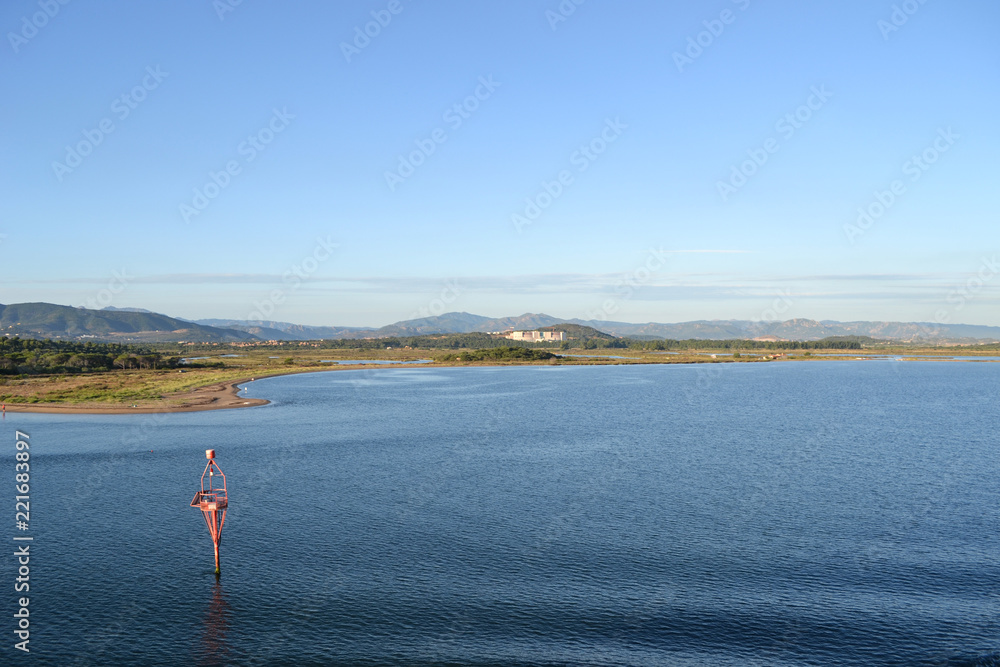Naklejka premium Landscape around Olbia, view from cruise ship arriving into the Olbia harbor in Sardinia