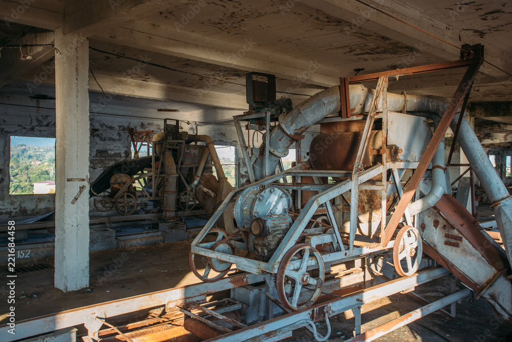 Rusty cart in old abandoned silo elevator in Eshera, Abkhazia