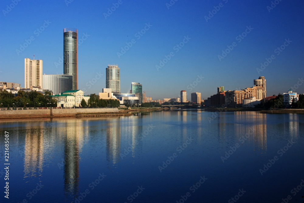 Buildings of the city of Yekaterinburg on the river bank