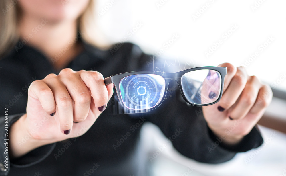 Foto de Person holding nanotech smart glasses. Eyewear with interactive
