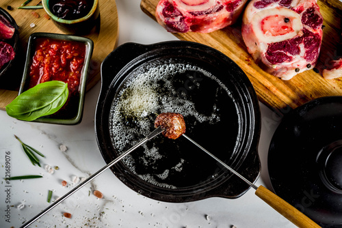 Beef meat fondue photo
