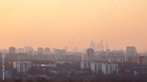 A lot of residential and commercial buildings in Moscow at sunset