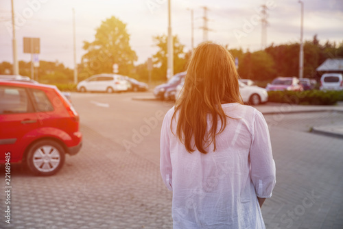 pregnant woman in the parking lot