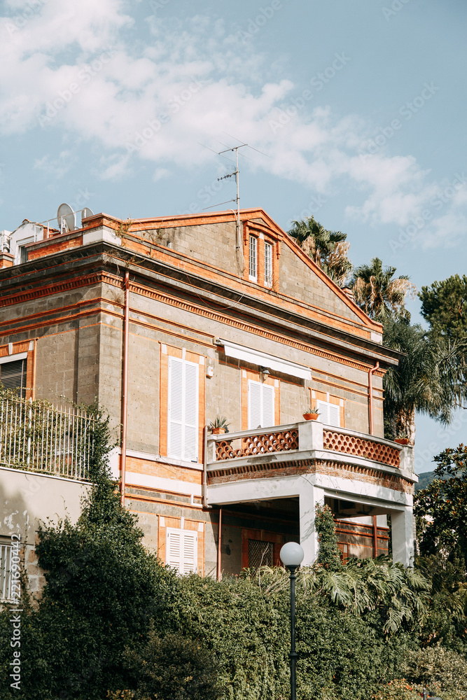 Views of the city of Sorrento in Italy, panorama and top view. Night and day, the streets and the coast. Beautiful landscape and brick roofs. Architecture and monuments of antiquity. Shops and street