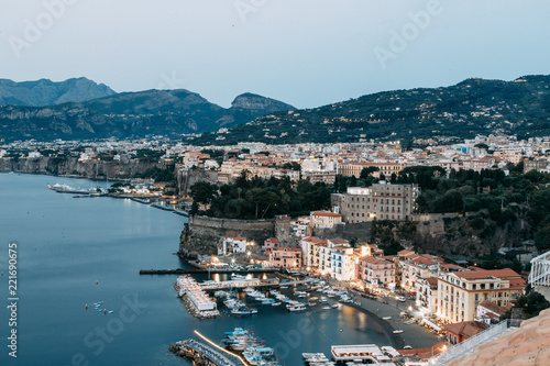 Views of the city of Sorrento in Italy, panorama and top view. Night and day, the streets and the coast. Beautiful landscape and brick roofs. Architecture and monuments of antiquity. Shops and street