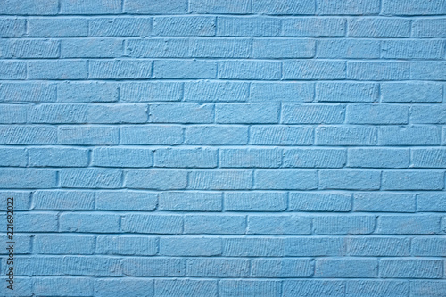 Painted external blue brick wall