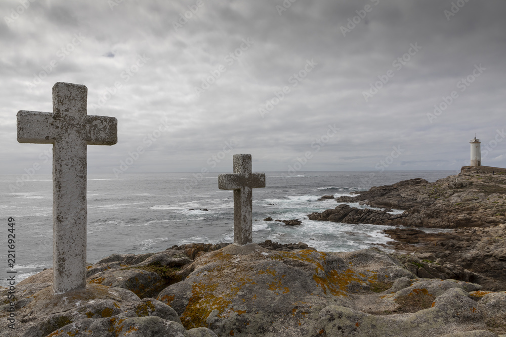 memorial cross for lost fishermen on Cape Roncudo (Faro de Cabo Roncudo) on the coast of death (costa da more ) in  galicia, spain