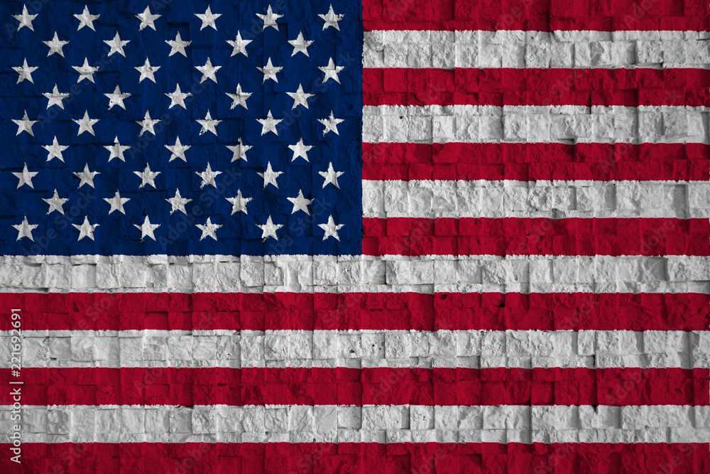 Fototapeta premium USA flag with wall background