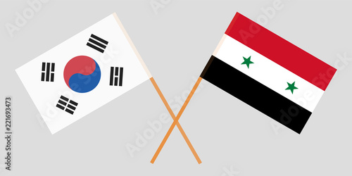 Crossed flags of Syrian Arab Republic and South Korea. Official colors. Correct proportion. Vector
