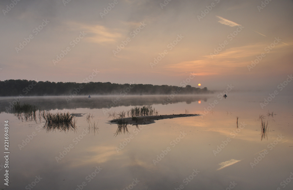 Beautiful sunrise on river in Russia in Moscow region 