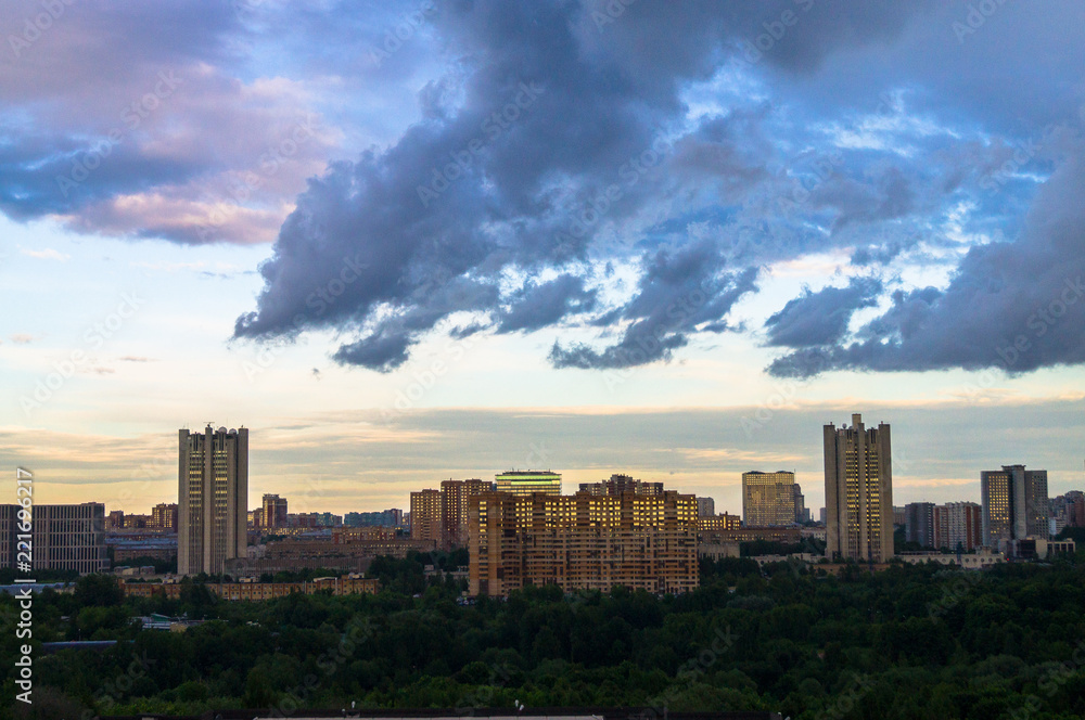 Summer panoramic view. Dramatic stormy sky over the environmentally friendly comfortable residential district in Moscow.