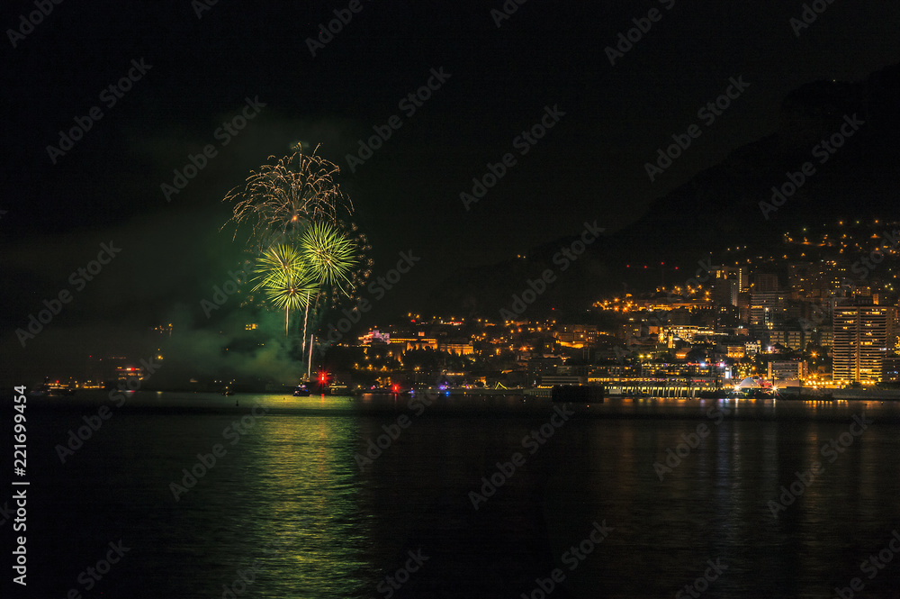 Panoramic lovely view of fireworks on the Principality of Monaco shortly after sunset