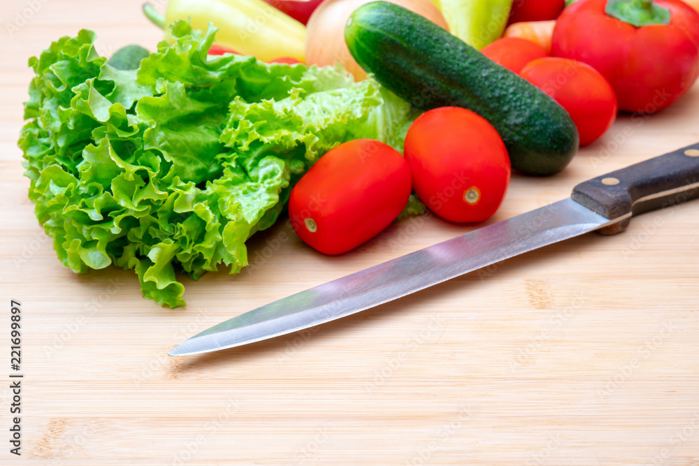 Vegetables: lettuce, onions, tomatoes, cucumbers, onions, carrots, red sweet peppers. Vegetables: lettuce, onions, tomatoes, cucumbers, onions, carrots, red sweet peppers.