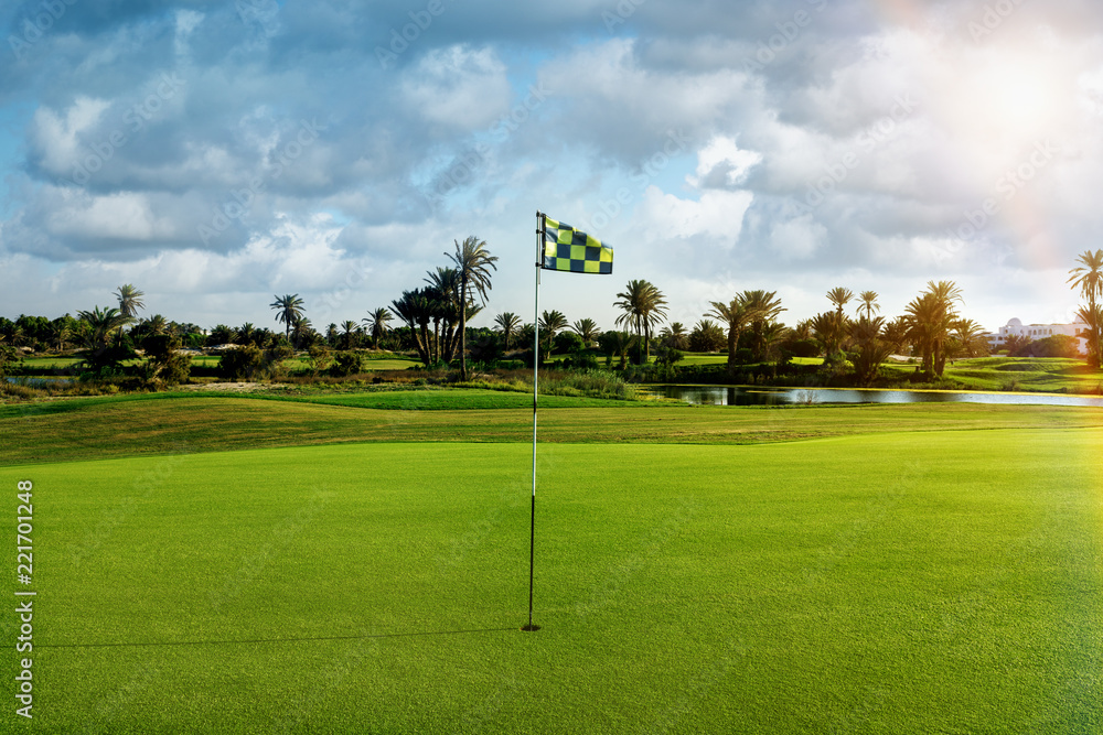 Golf course and flag Golf course and flag