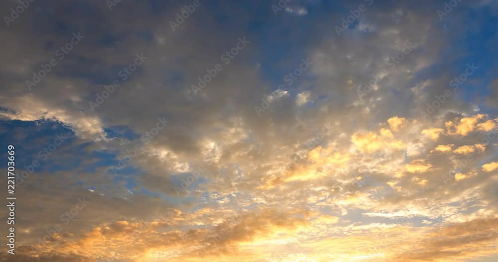 flying clouds against the setting rays of the sun flying clouds against the setting rays of the sun
