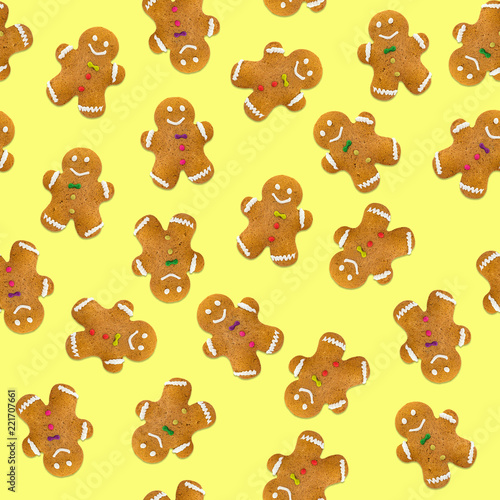 Christmas cookies on yellow background. Seamless pattern