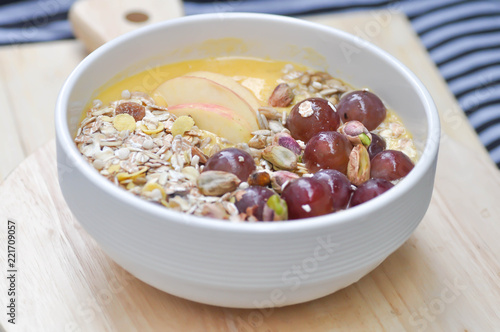 mango yogurt with oat,grape and apple