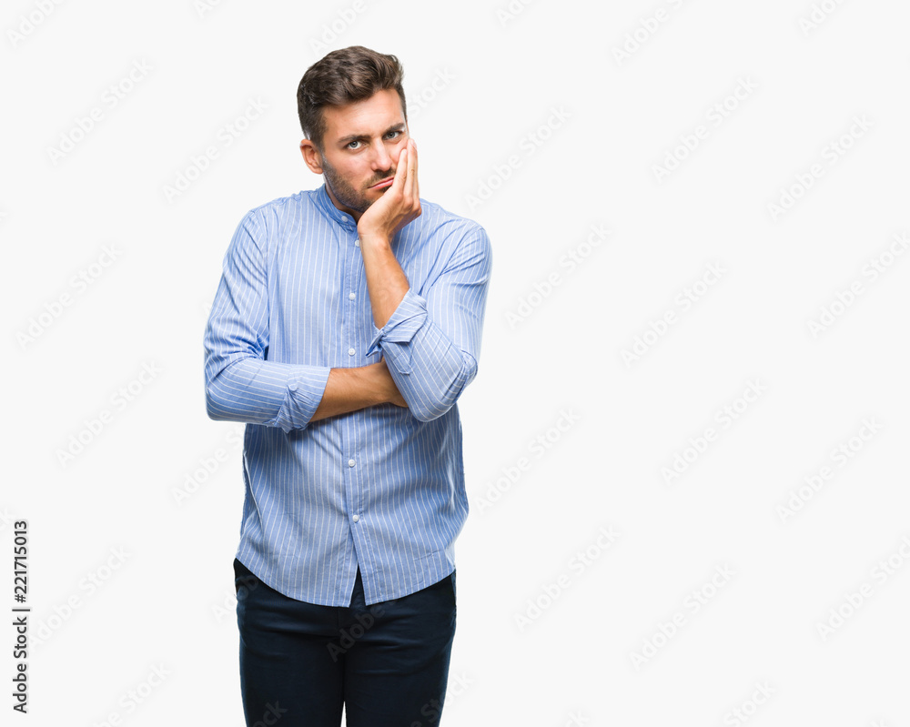 Young handsome man over isolated background thinking looking tired and bored with depression problems with crossed arms. Young handsome man over isolated background thinking looking tired and bored with depression problems with crossed arms.