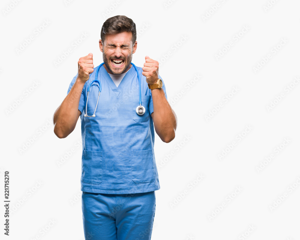 Young handsome doctor nurse man over isolated background excited for success with arms raised celebrating victory smiling. Winner concept. Young handsome doctor nurse man over isolated background excited for success with arms raised celebrating victory smiling. Winner concept.