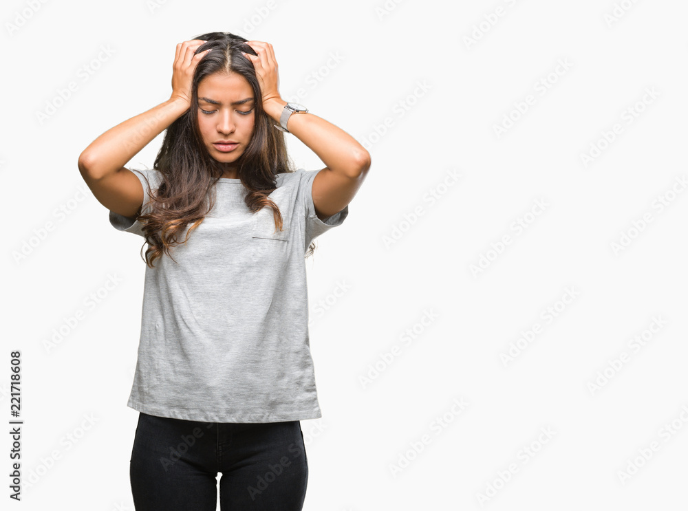 Young beautiful arab woman over isolated background suffering from headache desperate and stressed because pain and migraine. Hands on head. Young beautiful arab woman over isolated background suffering from headache desperate and stressed because pain and migraine. Hands on head.