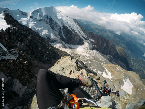 beautiful legs against the background of mountain peaks