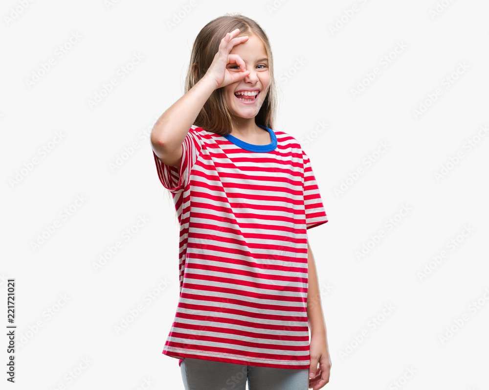 Young beautiful girl over isolated background doing ok gesture with hand smiling, eye looking through fingers with happy face. Young beautiful girl over isolated background doing ok gesture with hand smiling, eye looking through fingers with happy face.