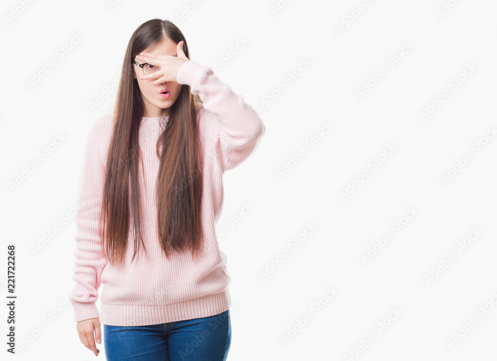 Young Chinese woman over isolated background wearing glasses peeking in shock covering face and eyes with hand, looking through fingers with embarrassed expression. Young Chinese woman over isolated background wearing glasses peeking in shock covering face and eyes with hand, looking through fingers with embarrassed expression.