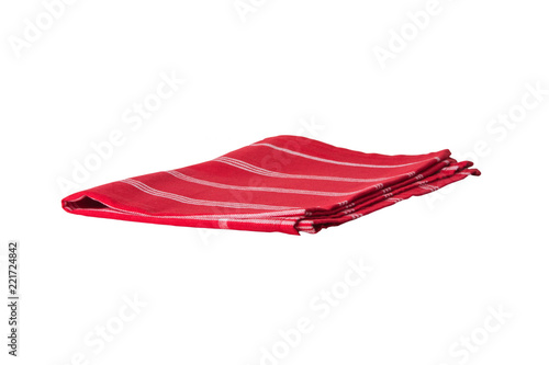 Red and white striped napkin isolated on white background. Kittchen accessories. photo