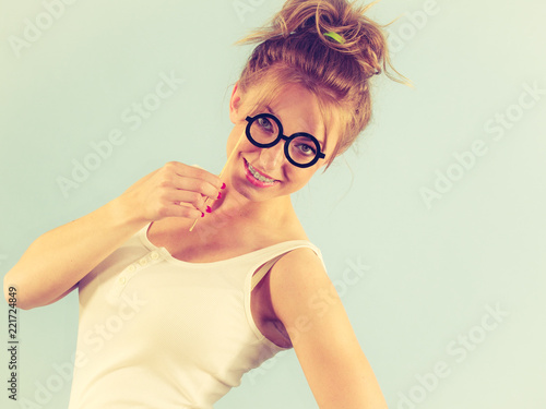 Elegant woman pretending wearing eyeglasses