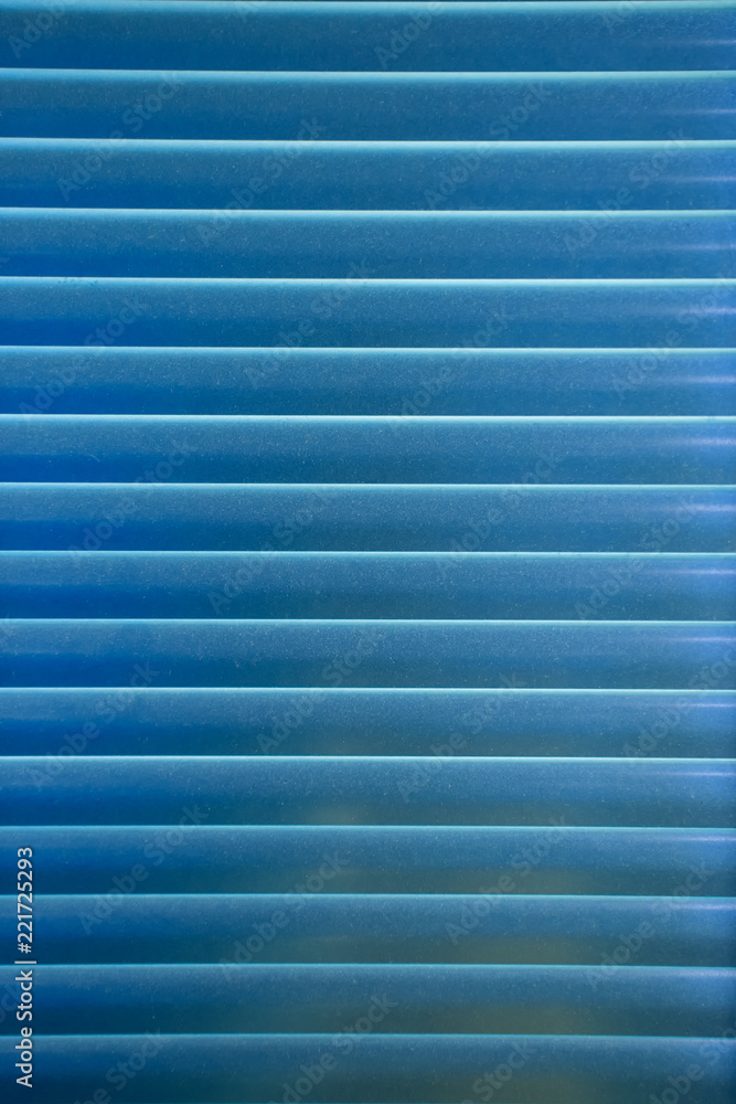 Horizontal pattern of purple venetian blinds Horizontal pattern of purple venetian blinds