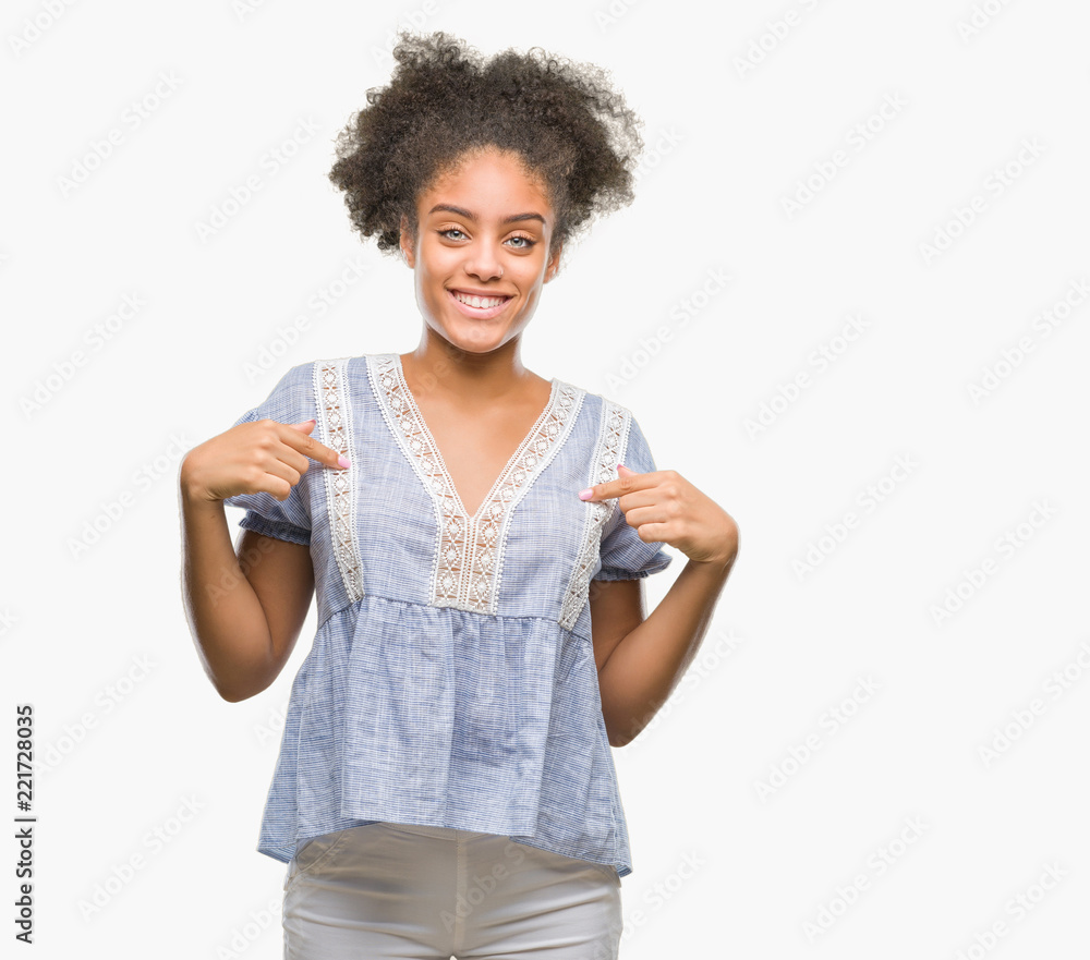 Young afro american woman over isolated background looking confident with smile on face, pointing oneself with fingers proud and happy. Young afro american woman over isolated background looking confident with smile on face, pointing oneself with fingers proud and happy.